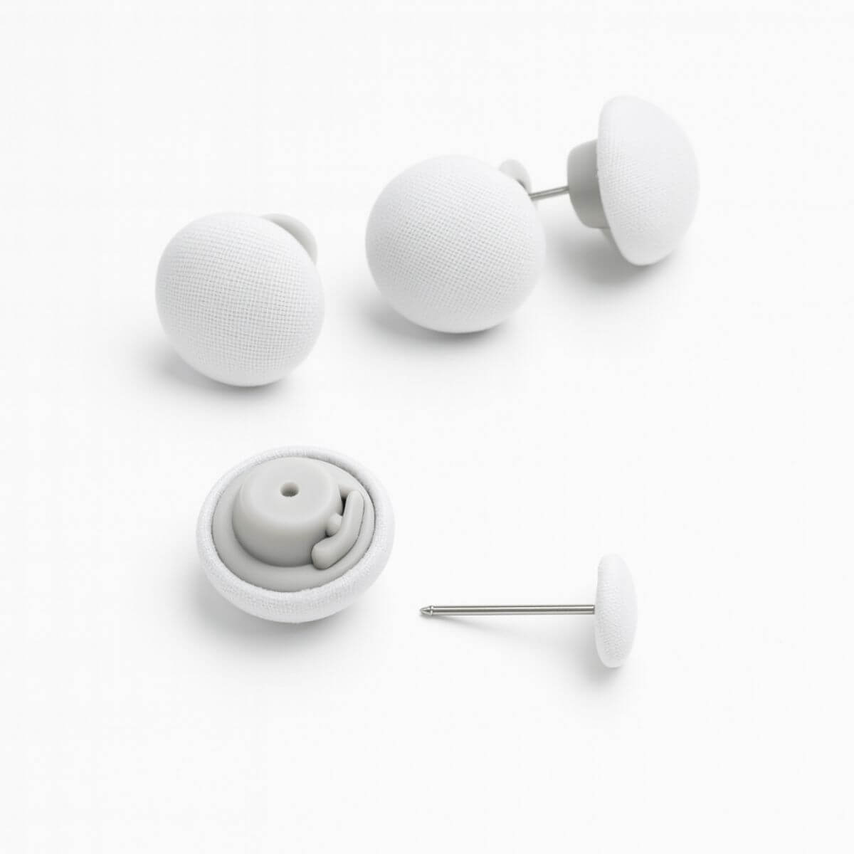 כפתורי פוך לשמירה על שמיכה יציבה בתוך הציפה